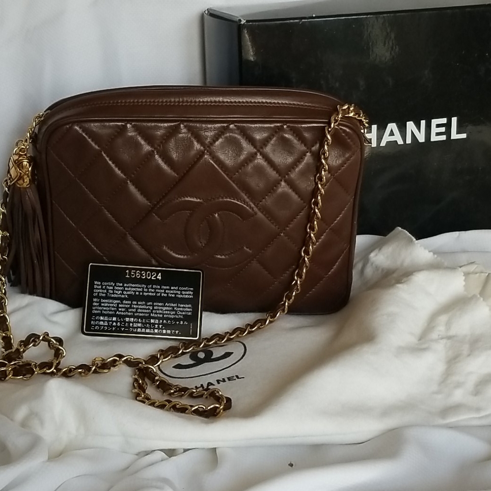 Chanel camera case with tassel